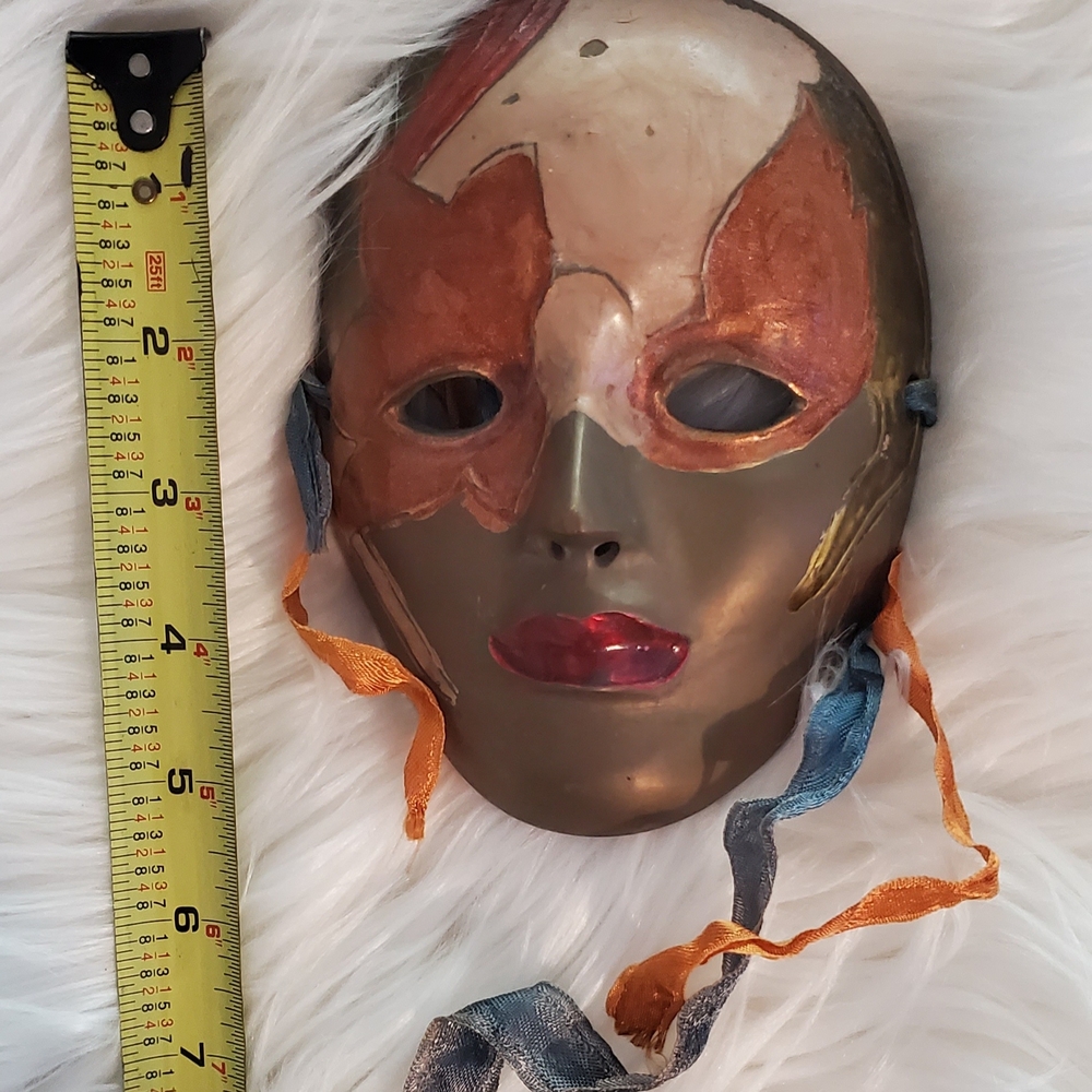 Elegant Bronze and Red Mask Sculpture (2)